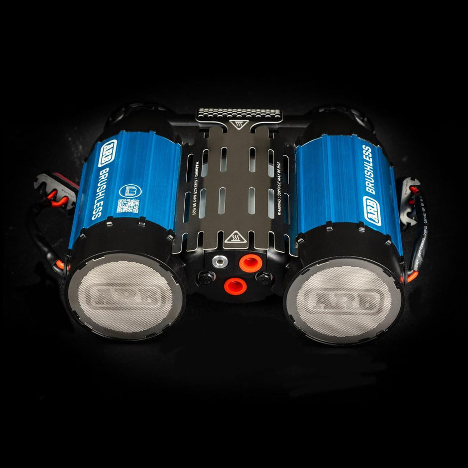 Top-down view of the ARB CKBLTA12 brushless twin motor onboard 12V air compressor.